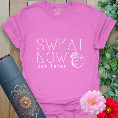Heather Radiant Orchid Sweat Now T-Shirt with bold slogan “Sweat Now, Zen Later” and yoga-inspired mandala icon. Motivational yoga lifestyle tee.