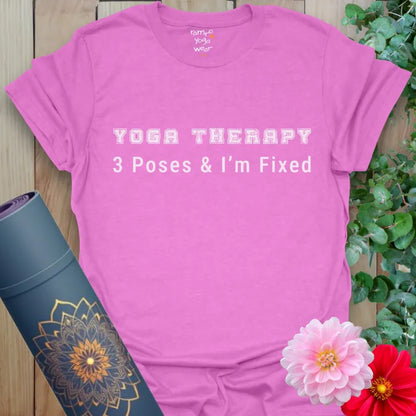 Heather Radiant Orchid Three Poses T-Shirt with standout retro text “Yoga Therapy” and “3 Poses & I’m Fixed.” Stylish and humorous yoga apparel.