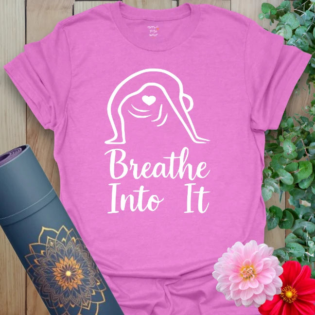 Radiant orchid-colored tee with flowing script and meditative pose artwork for soulful yoga practice.