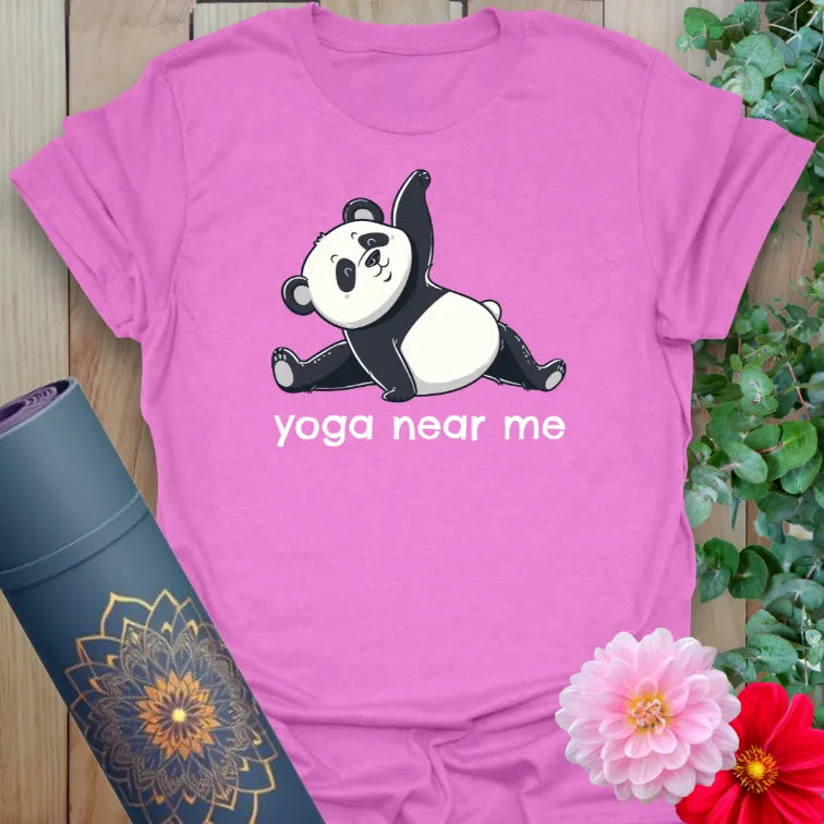 Radiant orchid-colored yoga tee with cute panda pose and humorous “yoga near me” print.