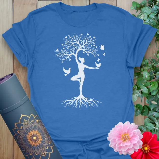 Blue yoga lifestyle tee with tree pose and ascending birds in white print