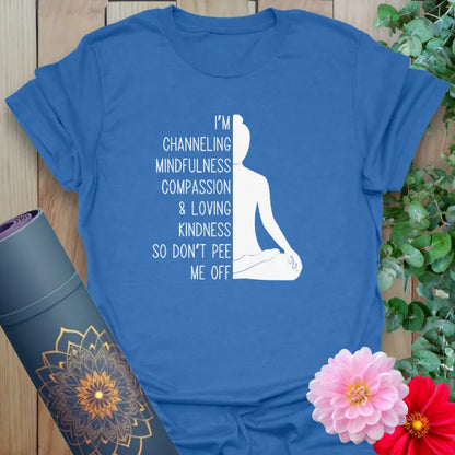 Blue yoga tee with mindful quote and meditative figure artwork

