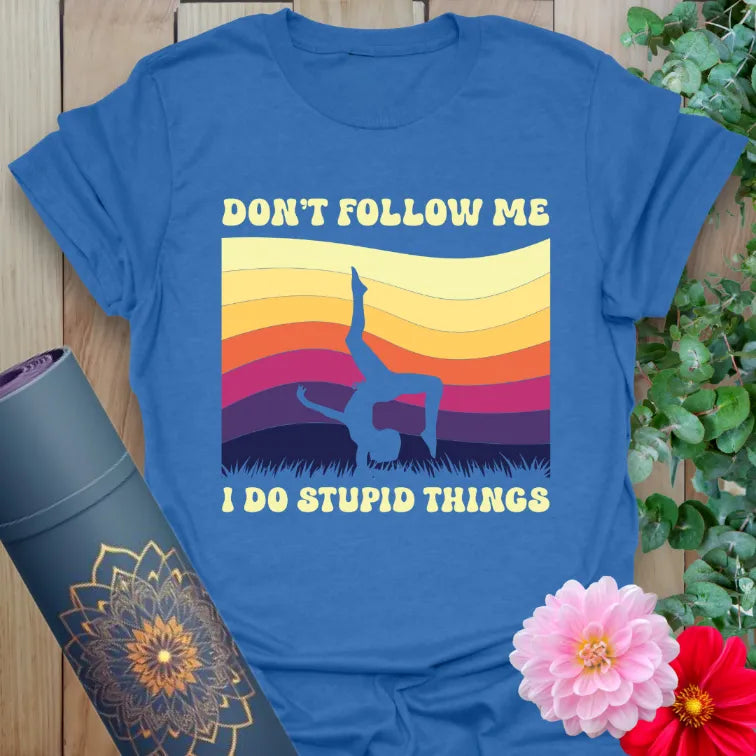 Blue Don't Follow T-Shirt with retro sunset background and playful yoga handstand artwork