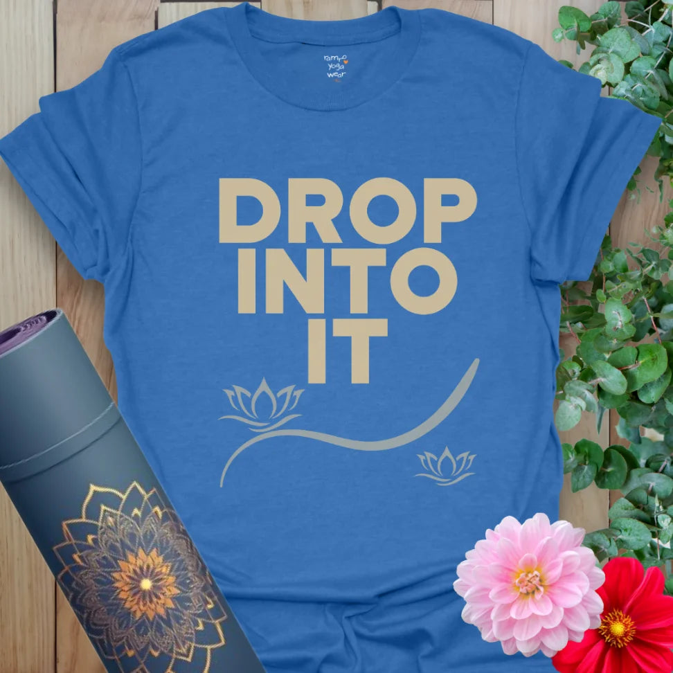 Heather Royal Drop Into It T-Shirt with crisp type and a serene lotus line. A mindful yoga lifestyle tee with lightweight unisex fit.