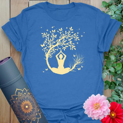 Soft cotton unisex yoga t-shirt with yogi seated beneath a crescent moon and blossoming tree for peaceful living.