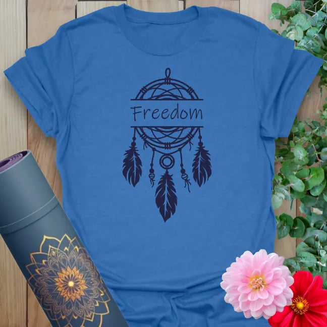 Soft cotton unisex yoga t-shirt featuring hand-drawn dreamcatcher with "Freedom" mantra symbolizing soulful liberation and mindful living.