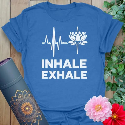 Soft cotton unisex yoga t-shirt featuring heartbeat line and lotus flower design with "Inhale Exhale" mindful breathing mantra.