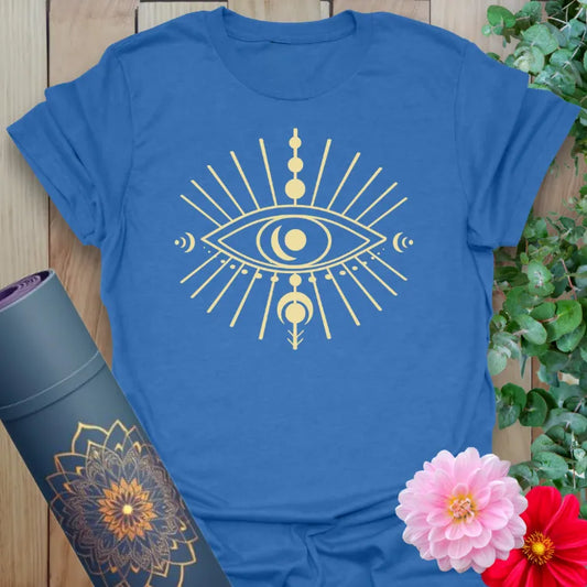 Soft cotton unisex yoga t-shirt featuring celestial eye design with moon phases and radiant energy beams for mindful, cosmic living.