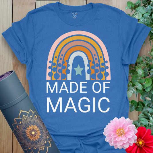 Soft cotton unisex yoga t-shirt featuring colorful retro rainbow, star, and "Made of Magic" affirmation design for positive, mindful living.