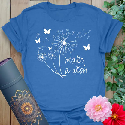 Soft cotton unisex yoga t-shirt featuring whimsical dandelion, butterflies, and "Make a Wish" design symbolizing hope and mindful manifestation.