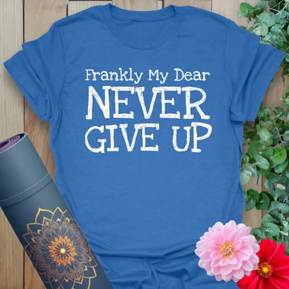 Soft cotton unisex yoga t-shirt featuring empowering "Frankly My Dear, Never Give Up" quote inspiring soulful resilience and mindful strength.