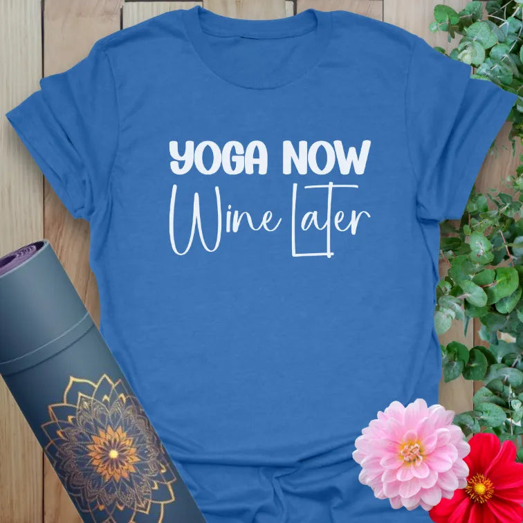 Soft cotton unisex yoga t-shirt featuring playful "Yoga Now, Wine Later" quote inspiring joyful mindful living and conscious balance.