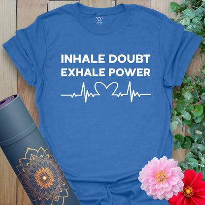 Soft cotton unisex yoga t-shirt featuring powerful "Inhale Doubt Exhale Power" quote with heart and heartbeat graphic for mindful, empowered living.