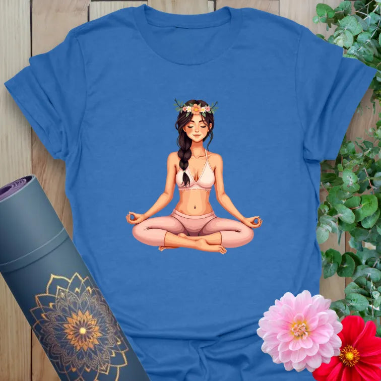 Soft cotton unisex yoga t-shirt featuring seated yogi with floral crown in lotus pose for mindful, soulful living.