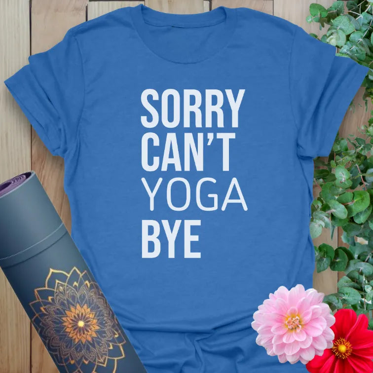 Soft cotton unisex yoga t-shirt featuring bold white text “Sorry Can’t Yoga Bye” for playful, boundary-loving mindful living.