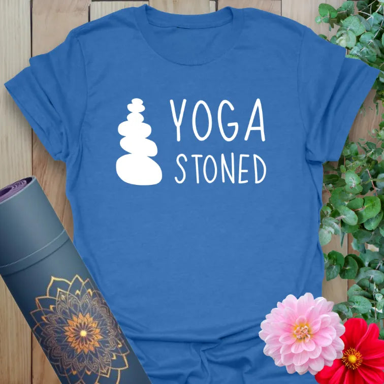 Soft cotton yoga t-shirt featuring stacked stone graphic and “YOGA STONED” text for mindful, humorous wear.