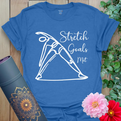 Soft cotton yoga tee featuring yogi in Triangle Pose and “Stretch Goals Met” design, ideal for movement with humor.