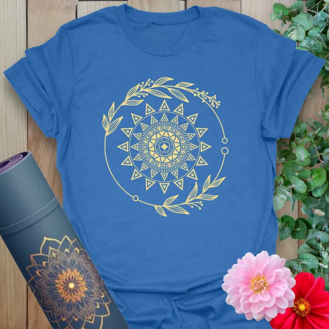 Soft cotton yoga tee featuring golden mandala sun and leafy sacred geometry circle, perfect for radiant spiritual style.