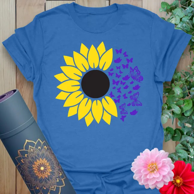 Soft cotton yoga t-shirt featuring bold yellow sunflower with purple butterflies symbolizing transformation and mindful growth.