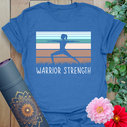 Soft cotton yoga tee featuring silhouetted Warrior II pose with sunset stripe background and “Warrior Strength” text.