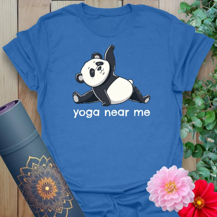 Soft cotton unisex yoga t-shirt with playful panda graphic and “yoga near me” text for lighthearted practice.
