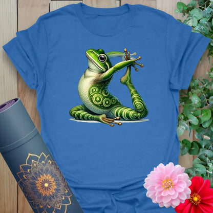 Soft cotton yoga tee featuring a detailed green frog in seated yoga pose with spiral markings for playful spiritual style.