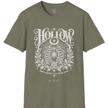 Symbolic ribcage engraving with a single glowing light at the center, crescent moon behind. Hollow T-Shirt flat lay is a Gildan 64000 and the color is Heather Military Green.