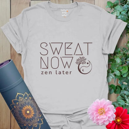 Ice Grey Sweat Now T-Shirt with clean typography: “Sweat Now, Zen Later” and small mandala. Street style yoga tee for energy and calm.