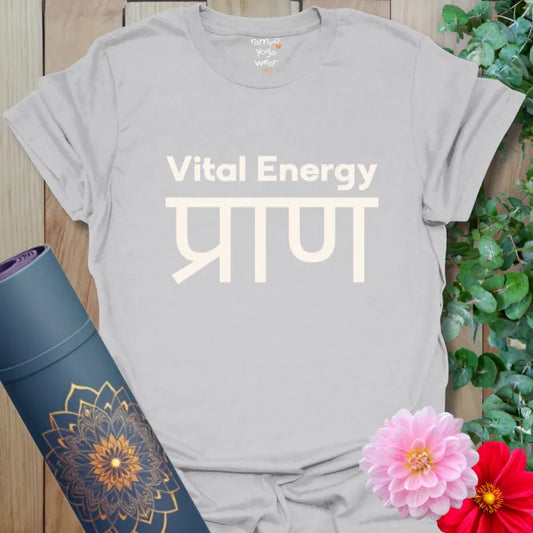 Ice Grey T-shirt with minimalist cream Sanskrit and English “Vital Energy” print. A calm yet bold spiritual statement piece.