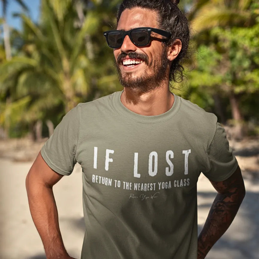 Person wearing If Lost tee in Heather Olive sacred yoga shirt outdoors with palm trees — Funny Yoga Shirts collection by Ramro Yoga Wear