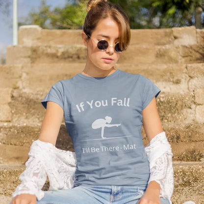 Woman wearing the If You Fall T-Shirt in Stone Blue, sitting outdoors with sunglasses — The Vault collection by Ramro Yoga Wear