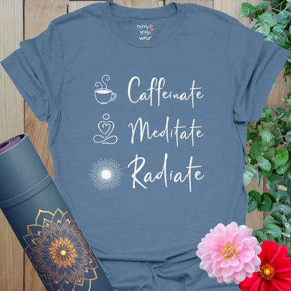 Indigo Blue Caffeinate T-Shirt with bright white graphics. Perfect for pairing your flow state with your favorite brew.