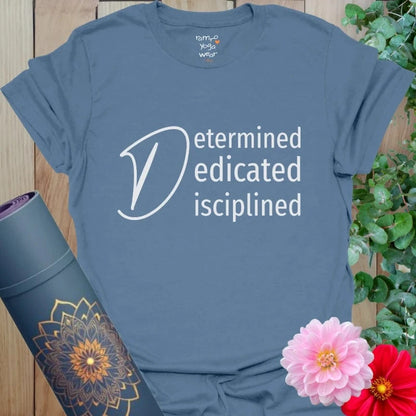 Indigo Blue Determined T-Shirt with soft white text, perfect for yoga lovers who stay focused and balanced.