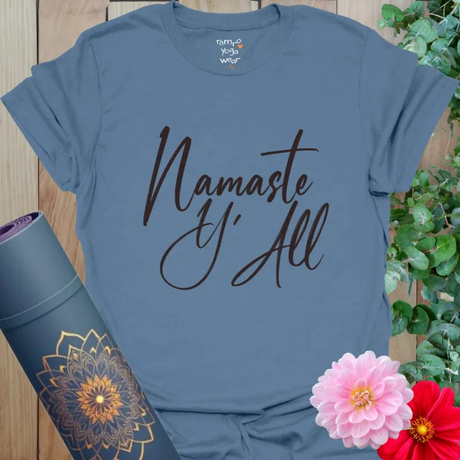 Indigo Blue Namaste Y’All Tee with flowing handwritten font. A playful, mindful shirt with charm and contrast.