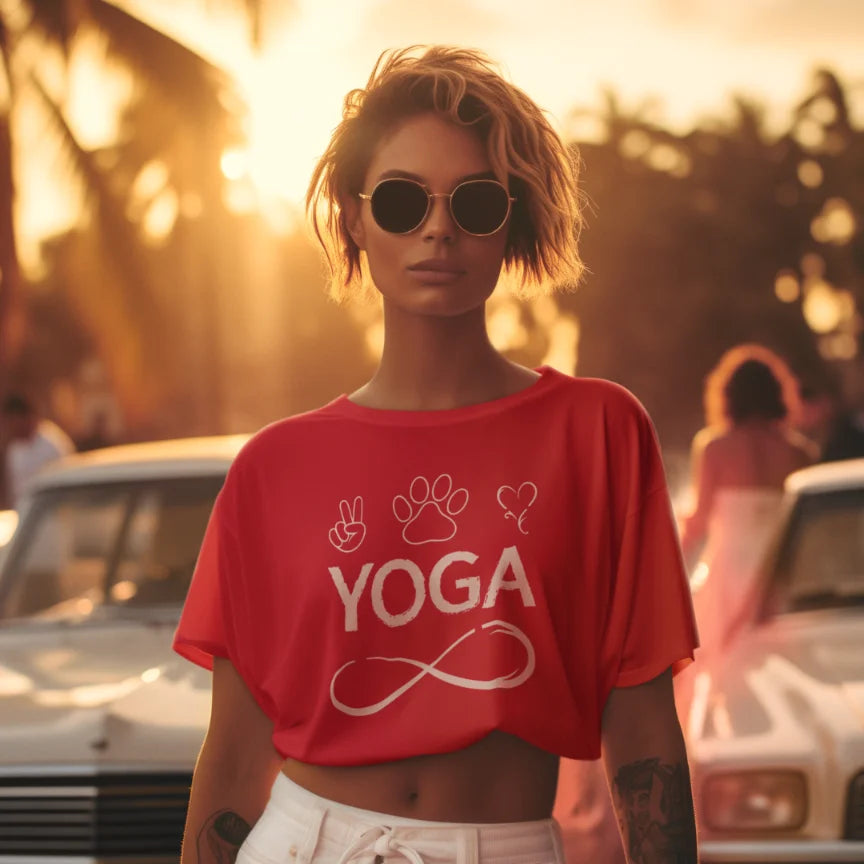 Woman wearing Infinite Yoga T-Shirt Red sacred yoga shirt outdoors in golden hour light — The Vault collection by Ramro Yoga Wear