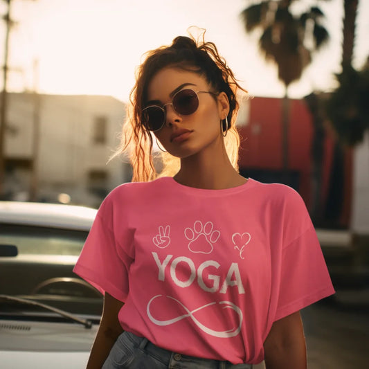 Infinite Yoga T-Shirt lifestyle image featuring model wearing coral yoga graphic tee with relaxed mindful street-style aesthetic.