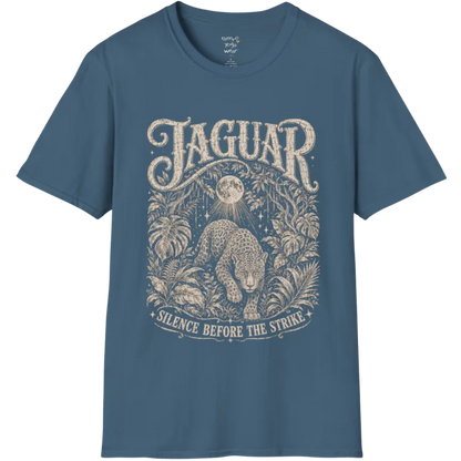 A grunge short sleeved tee with an illustrated jaguar resting in tropical foliage, crescent moon above, text reading "Jaguar" and "Silence Before The Strike" — Wild Animals collection by Ramro Yoga Wear in Indigo Blue.