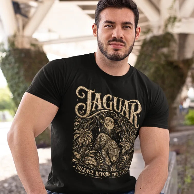 Person wearing the Jaguar T-Shirt in Black, standing outdoors under a covered walkway with greenery — Wild Animals collection by Ramro Yoga Wear.