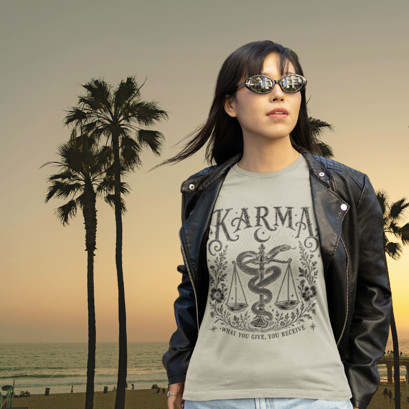 Woman wearing Karma sand sacred yoga shirt at golden hour with palm trees — Sacred Thread collection by Ramro Yoga Wear