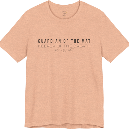 GUARDIAN OF THE MAT KEEPER OF THE BREATH yoga teacher gift tee flat lay in Heather Peach — Yoga Teacher Gifts collection by Ramro Yoga Wear