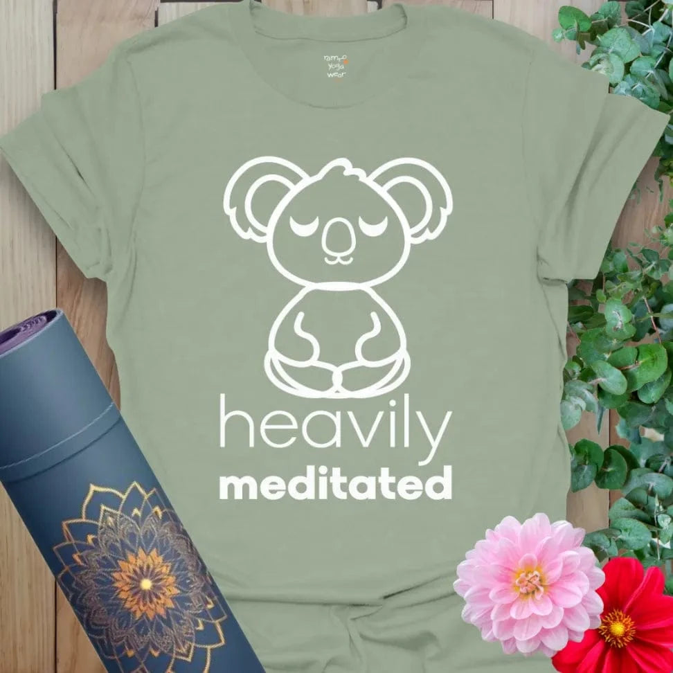 Calm sage green yoga t-shirt with charming koala meditating design and light-hearted mindfulness mantra.