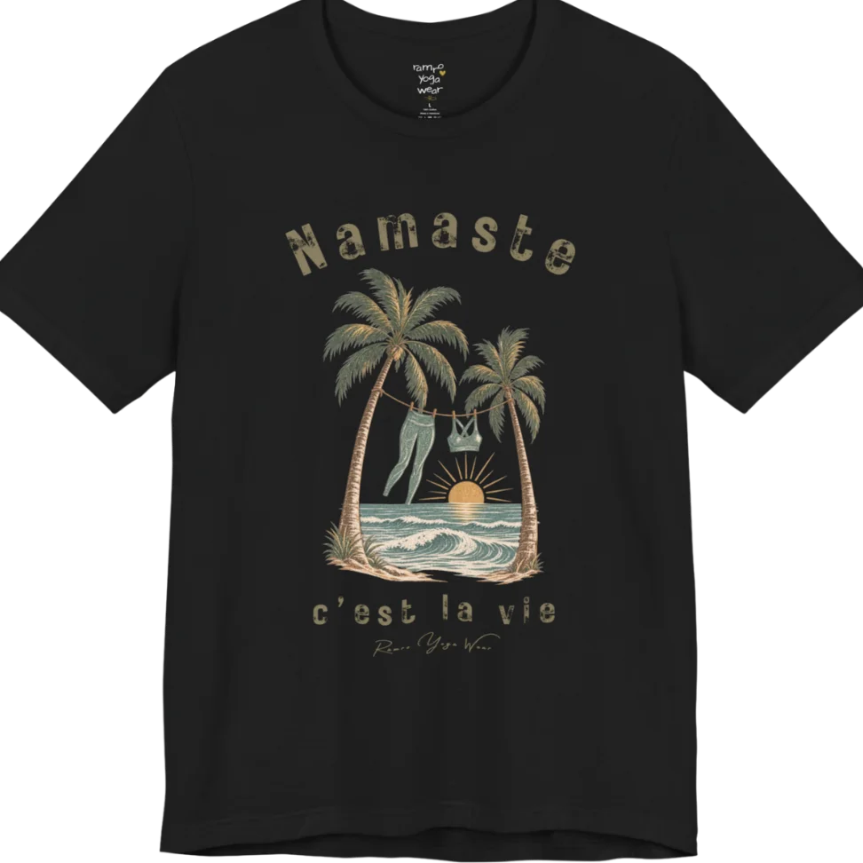 A short sleeved grunge tee with an illustrated scene of two palm trees framing a clothesline with leggings and a sports bra hanging between them, sun setting over waves, text reading "Namaste" and "c'est la vie" — Funny Yoga Shirts collection by Ramro Yoga Wear in Black.