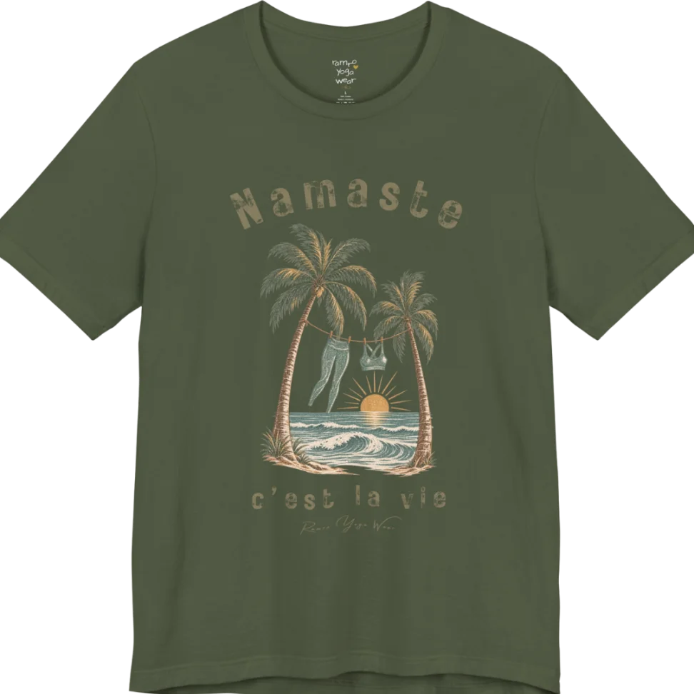 A short sleeved grunge tee with an illustrated scene of two palm trees framing a clothesline with leggings and a sports bra hanging between them, sun setting over waves, text reading "Namaste" and "c'est la vie" — Funny Yoga Shirts collection by Ramro Yoga Wear in Military Green.
