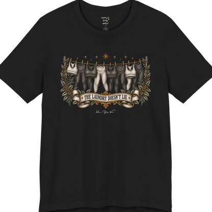 A short sleeved tee. Illustrated clothesline strung with repeating pairs of leggings and tops, framed by botanical leaf sprigs and stars. Laundry T-Shirt flat lay is a Bella+Canvas 3001 and the color is Black.