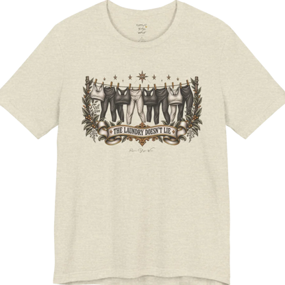 A short sleeved tee. Illustrated clothesline strung with repeating pairs of leggings and tops, framed by botanical leaf sprigs and stars. Laundry T-Shirt flat lay is a Bella+Canvas 3001 and the color is Heather Prism Natural.