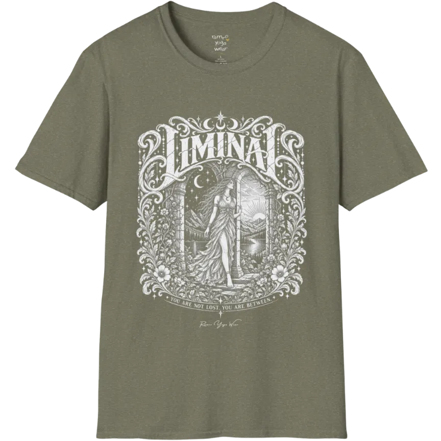 A short sleeved tee called the Liminal T-Shirt, flat lay and a soft cotton shirt. Simply says, 'You are not lost. You are between.' Design highlights ornate white LIMINAL lettering framed by flourishes and wild florals, with a robed figure standing in an arched doorway beneath a crescent moon and stars. Color is Heather Military Green.