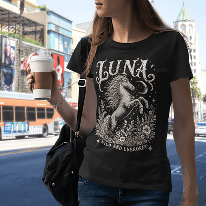 Ramro Yoga Wear Luna tee in Black — lifestyle shot, city street, wild horse botanical vintage engraving