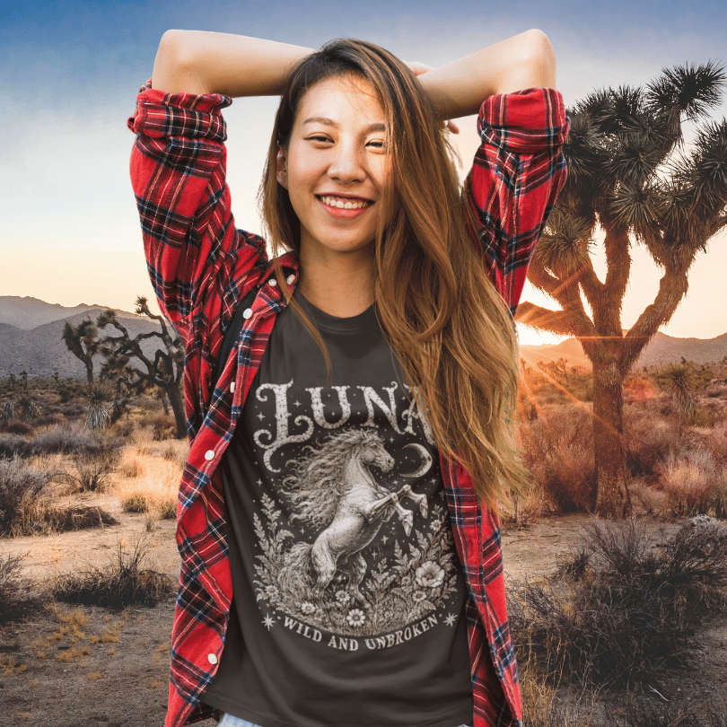Ramro Yoga Wear Luna tee — lifestyle shot, desert sunset, wild horse botanical vintage engraving