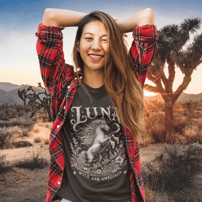 Ramro Yoga Wear Luna tee — lifestyle shot, desert sunset, wild horse botanical vintage engraving