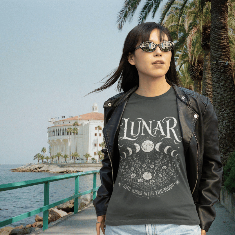 Ramro Yoga Wear Lunar tee in Dark Heather Grey — she rises with the moon lunar cycle design, coastal Mediterranean lifestyle shot